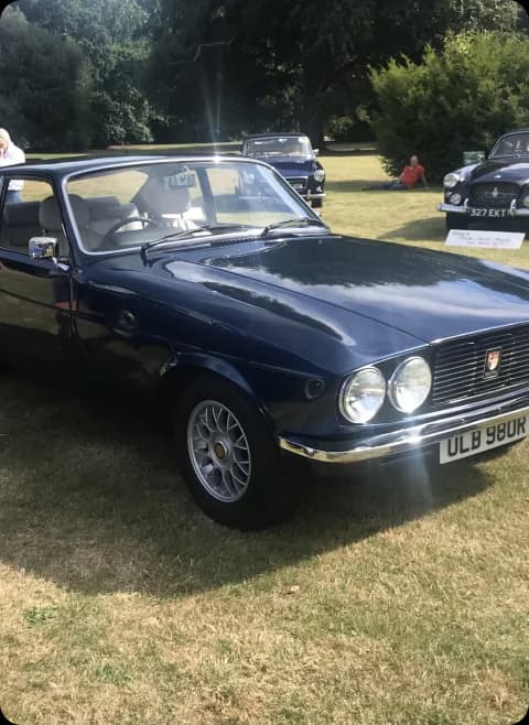 bristol car parked on the grass